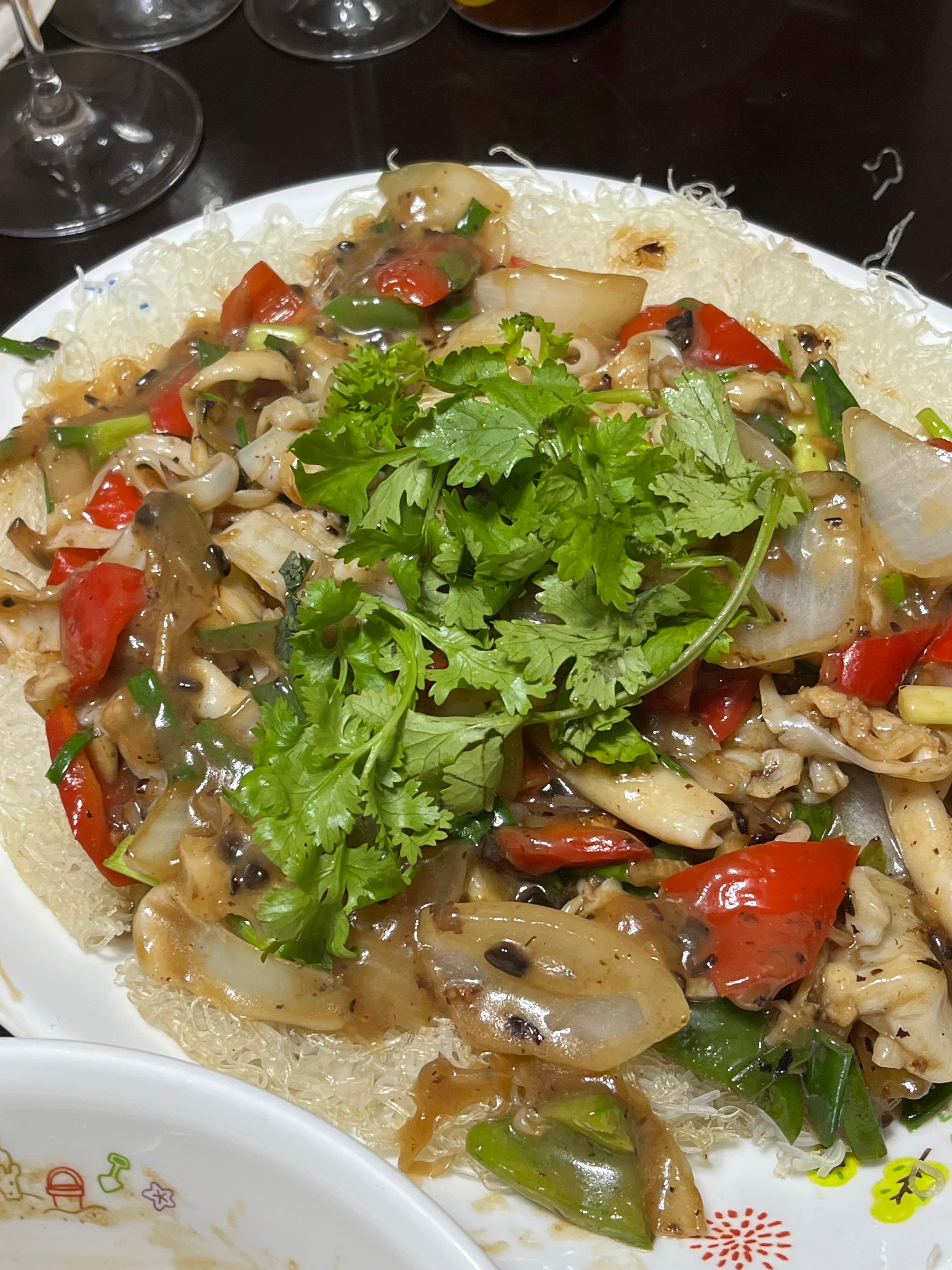 Razor clams with black bean on crispy vermicelli